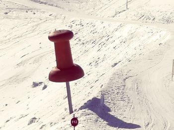 High angle view of snow on sand