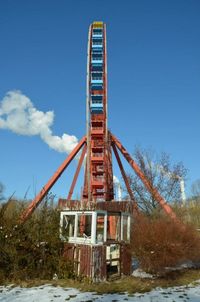 Low angle view of built structure against blue sky