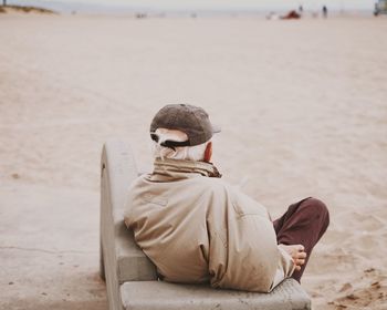 Rear view of senior man sitting