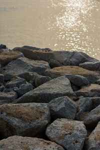 Close-up of pebbles on beach