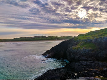 Scenic view of sea against sky during sunset