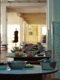 People in bowl on table