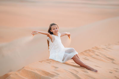 Portrait of a young woman in desert