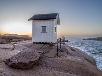 Lighthouse on a cliff on the coast