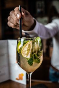 Close-up of hand holding drink