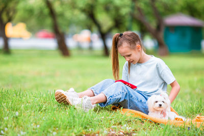 Girl playing with toy on field