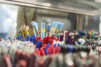 Close-up of writing instruments for sale in store