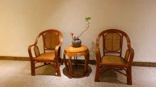 Chairs and table against wall at home