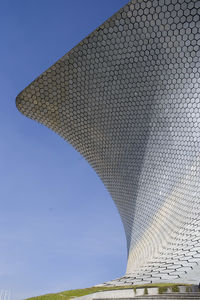 Low angle view of historical building against blue sky