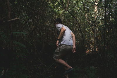 Man walking in forest