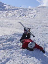 Tourists enjoying on snow covered mountain