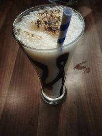 High angle view of coffee cup on table