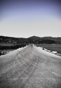 Scenic view of road against clear sky