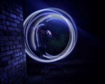 Close-up of illuminated lighting equipment at night