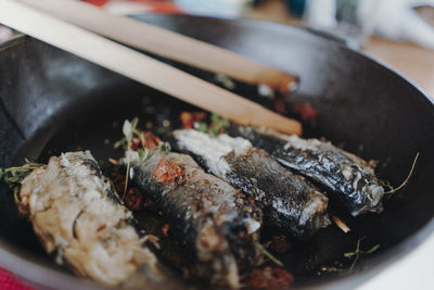 Close-up of fish on barbecue grill