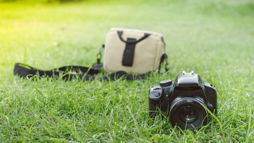 Close-up of camera on field