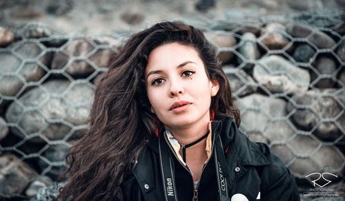 Portrait of beautiful young woman outdoors