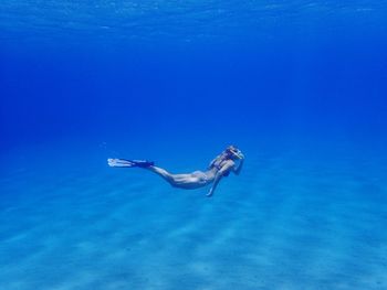 Full length of woman swimming in sea