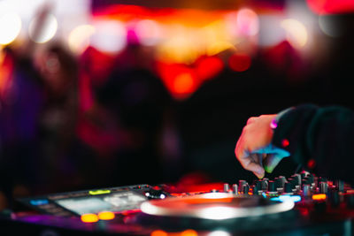 Close-up of dj in nightclub