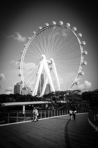 People walking on street at night