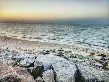 Scenic view of sea against sky during sunset