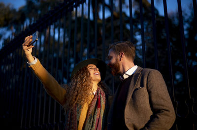 Young couple standing outdoors