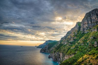 Scenic view of sea against sky at sunset