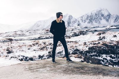 Full length of a man standing on snow