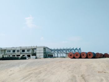 High angle view of toy on beach against sky