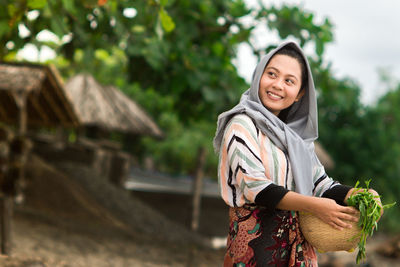 Portrait of a smiling young woman