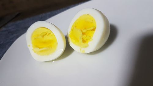 Close-up of yellow eggs on table