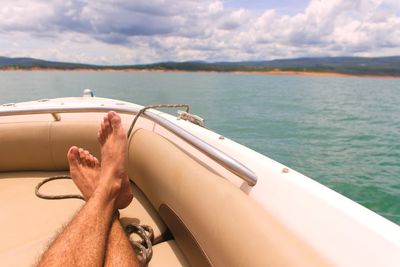 Relaxing on the boat on the middle of the waters.