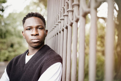 Young african american man outdoor, street portrait. fall or spring season