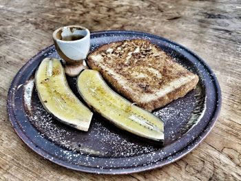 Directly above shot of breakfast in plate on table