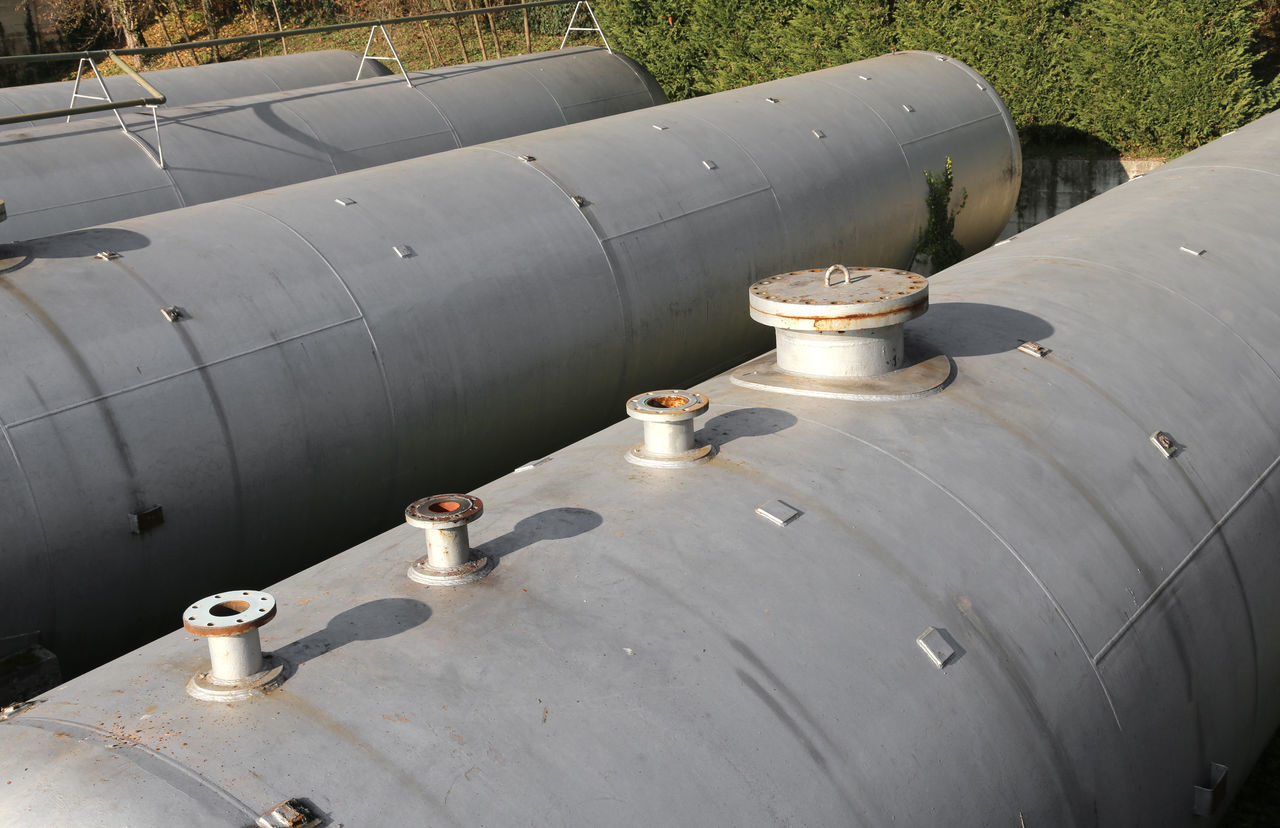 HIGH ANGLE VIEW OF WATER PIPE ON STREET