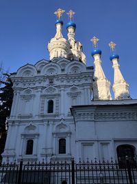 Low angle view of statue against sky