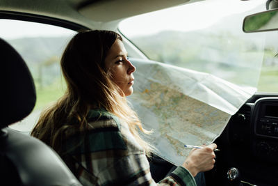 Portrait of woman in car