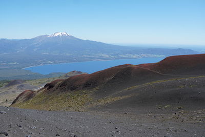 Panoramic view of volcanic landscape against sky