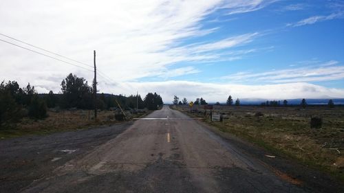 Road on landscape against sky