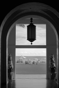 People on window of building