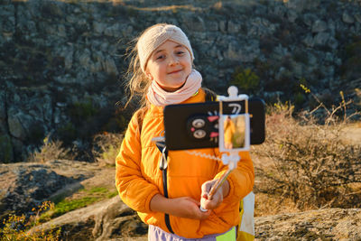 Young woman using mobile phone