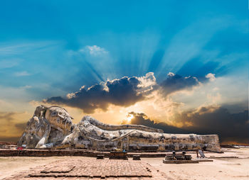 Panoramic view of town against sky during sunset