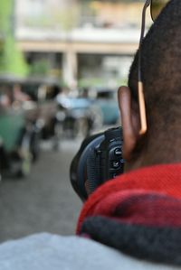 Cropped image of woman holding smart phone