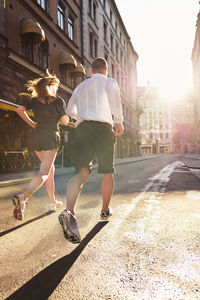 Couple jogging, stockholm, sweden