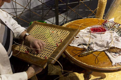 High angle view of man working in shopping mall