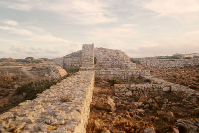 View of old ruin building against sky