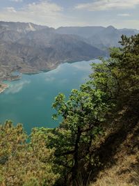 Scenic view of tree mountains against sky