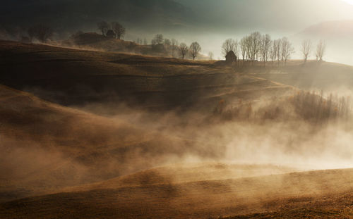 View of landscape during foggy weather