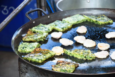 Close-up of vegetables in cooking pan