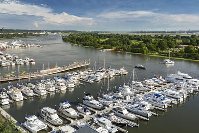 High angle view of boats moored at harbor